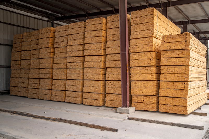 Softwood lumber stacked for construction delivery